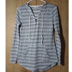 Gray and white striped sweater with hoodie